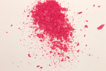 This is a photograph of Fuschia Pink powder Blusher isolated on a White background
