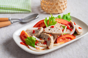 Spicy vietnamese pork sausage salad (Yum Moo Yor), Thai food style