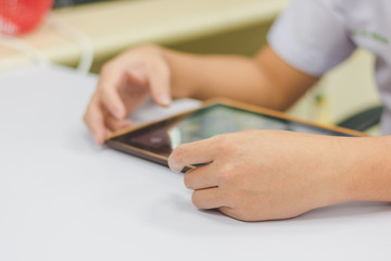 closeup of hand using mobile phone