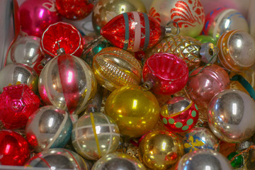Selective Focus Closeup of Colorful Vintage Christmas ornaments of various size and shape