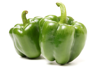 fresh green bell pepper (capsicum) on a white background