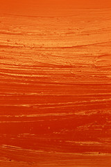This is a photograph of Orange Lipstick swatch background