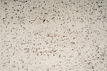 Cemento con agujeros de color blanco