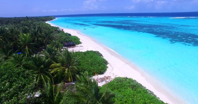 Aerial view drone footage over coastline of tropical island beach Punta Cana, Dominican Republic