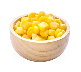 Corn seeds in wood bowl isolated on the white background