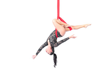 Beautiful woman Asian sport girl fly yoga posing on a red hammock isolated white background ,...