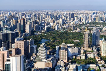 Fototapeta na wymiar The Metropolitan Bangkok City - Aerial view urban tower Bangkok city Thailand on April 2019 , blue sky background , Cityscape Thailand