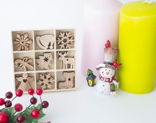 Set of Christmas wooden toys, candles and Christmas figurines