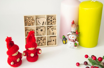 Set of Christmas wooden toys, candles and Christmas figurines