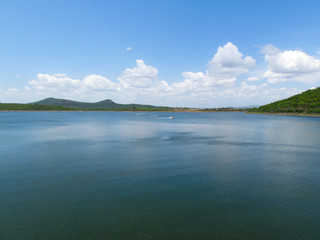 Açude Argemiro de Figueiredo em Itatuba Paraíba PB Brasil landscape with river and blue sky
