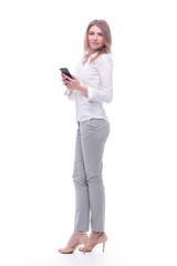 Fototapeta premium smiling business woman reading e-mail on her smartphone. isolated on white