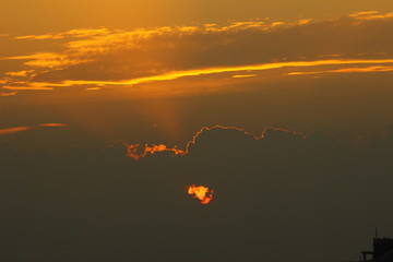sun rise clouds in yellow
