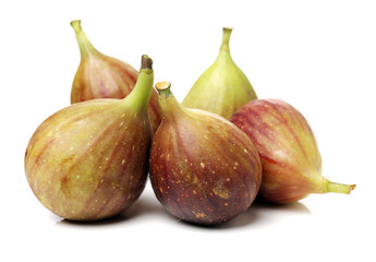 Ripe figs on a white background