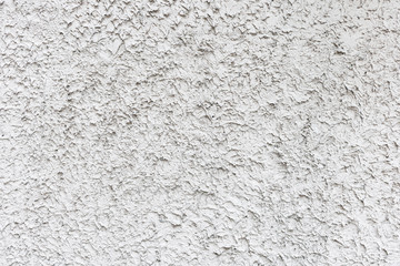 Rough white relief stucco wall texture background. blank for designers