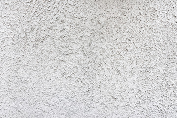 Rough white relief stucco wall texture background. blank for designers
