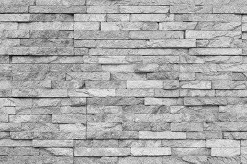 White natural facade stone decoration quartzite background texture. modern granite stone wall.