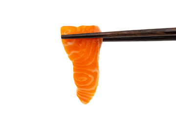 Salmon raw sashimi with chopsticks on a white background - obrazy, fototapety, plakaty