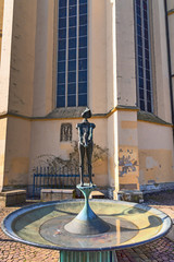 Fototapeta na wymiar Steckenpferdreiter-Brunnen an der St. Katharinenkirche in Osnabrück, Niedersachsen