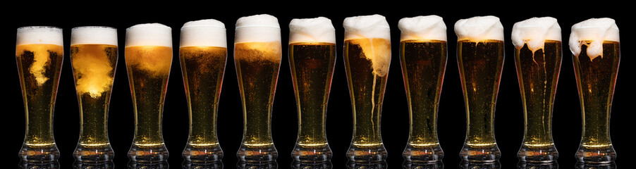 Set of Glasses of Beer Isolated on Black Background