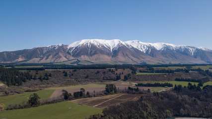 Beautiful aerial view of Mount Hutt from Rakaian Gorge.Panoramic view of snow cap mountain in New Zealand.
