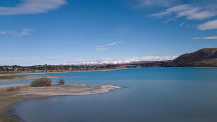 Lake Tekapo aerial view during sunny day.