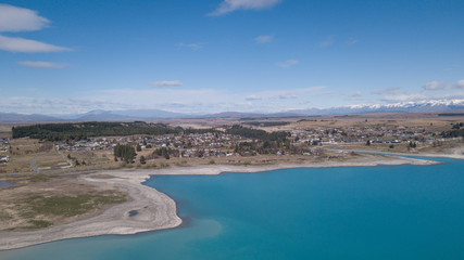 Fototapeta na wymiar Lake Tekapo aerial view during sunny day.