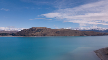 Obraz premium Lake Tekapo aerial view during sunny day.