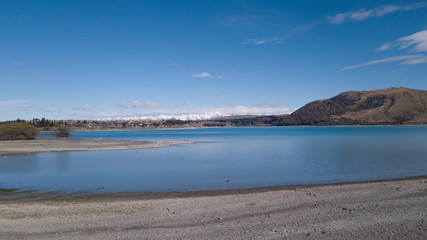 Lake Tekapo aerial view during sunny day.