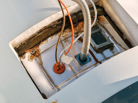 Inside Panel of Leaking Water Heater