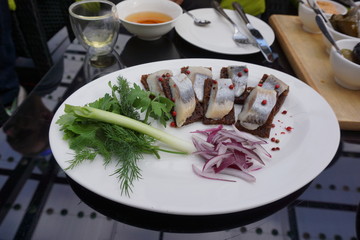 a plate with herring