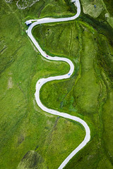 White serpentine on green hills in Dolomites