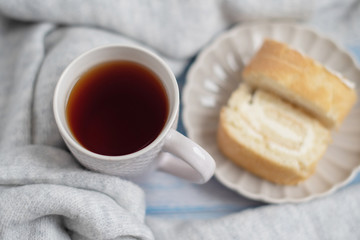 cozy tea party with biscuit roll