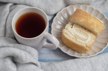 cozy tea party with biscuit roll
