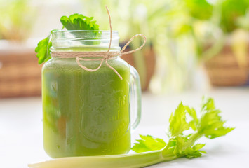 fresh celery juice in a jar. concept of healthy food and detox. Selective focus.
