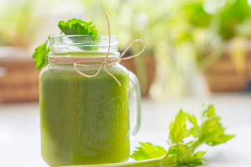 fresh celery juice in a jar. concept of healthy food and detox. Selective focus.
