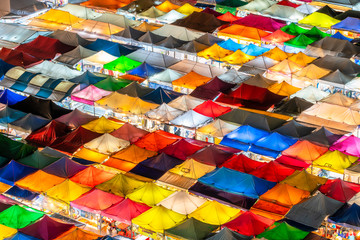 Fototapeta na wymiar Colorful tent at night market in city downtown Bangkok. 