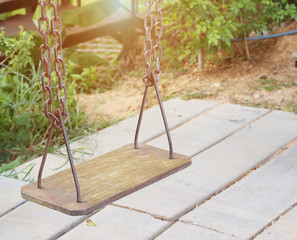 Empty chain swing in playground at park