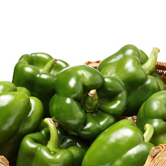 fresh green bell pepper (capsicum) on a white background