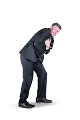 Obraz premium Scared male manager embracing suitcase on studio