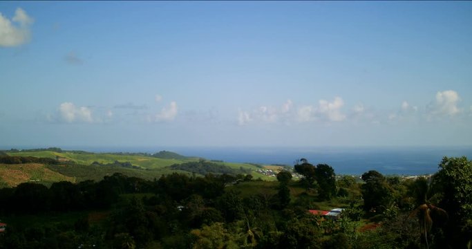 High contrast timelaps in martinique, Caribbean island. hyperlapse of beautiful scenery with blue sky and green trees.