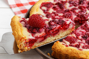 Closeup piece of homemade raspberry pie with yogurt filling. Shallow focus.
