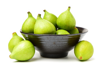 Ripe figs on a white background