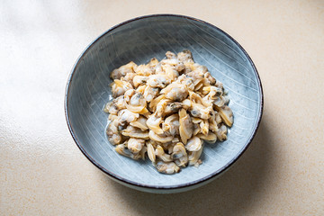 a plate of fresh flowered meat on the kitchen countertop