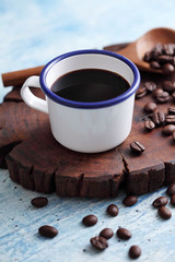 Coffee in cup and coffee bean on rustic table with a blank space for a text, Espresso in cup on blue background