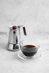 Coffee in cup and moka pot on rustic table with a blank space for a text, Espresso in cup on white background