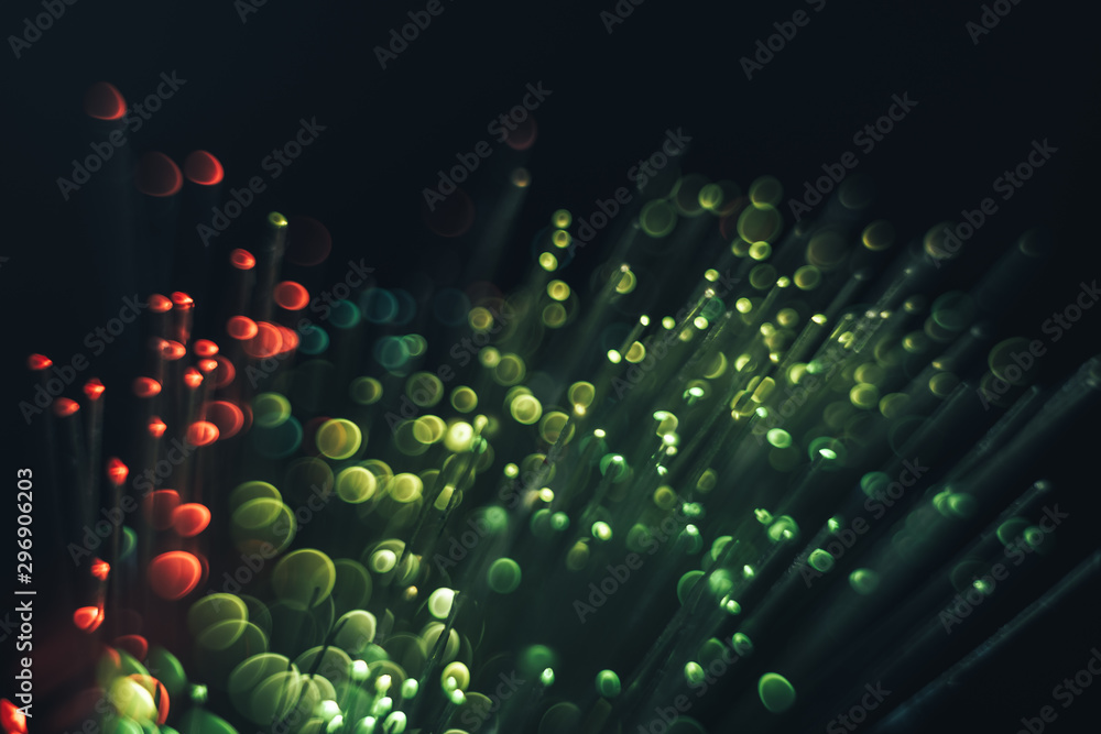 Aufkleber beautiful abstract optical fiber green and red cold bokeh in the darkness background.