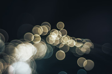 Beautiful abstract optical fiber white light bokeh in the darkness background.