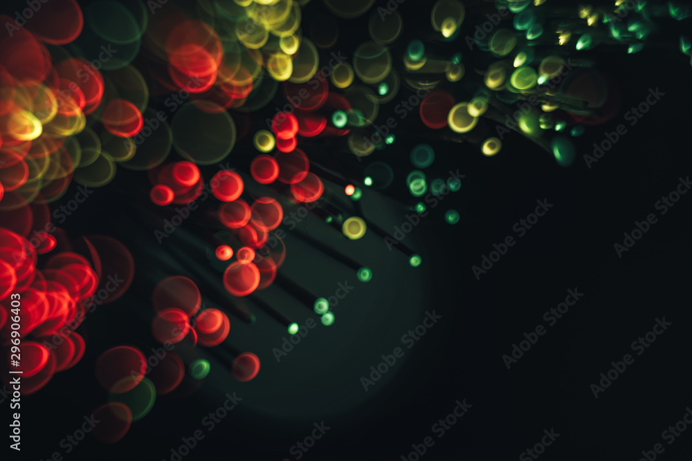 Poster Beautiful abstract fiber optical network cable on a multi colored glow background.