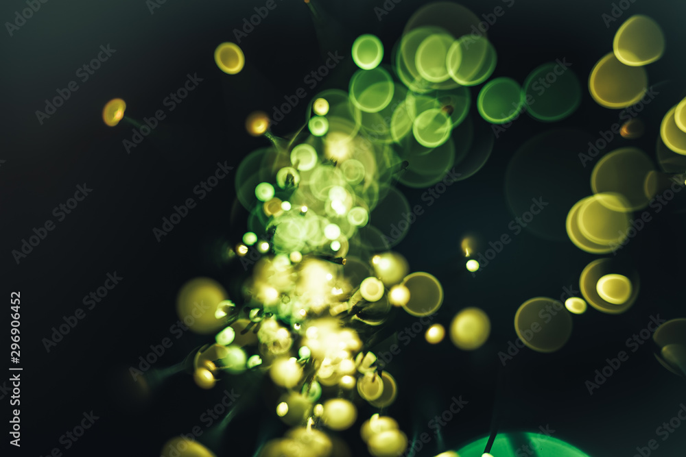 Aufkleber Beautiful abstract fiber optical network cable on a multi colored glow background.