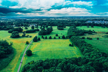 Fototapeta premium Aerial drone view Irish landscape in Dublin county, Ireland. New bridge park situated in Donabate, is a great way to spend your weekend outdoors with your family and friends.